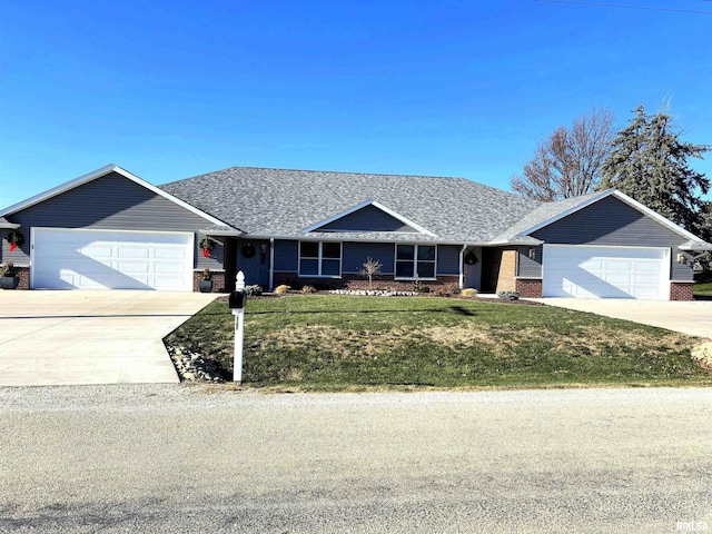 ranch-style house with a front lawn and a garage