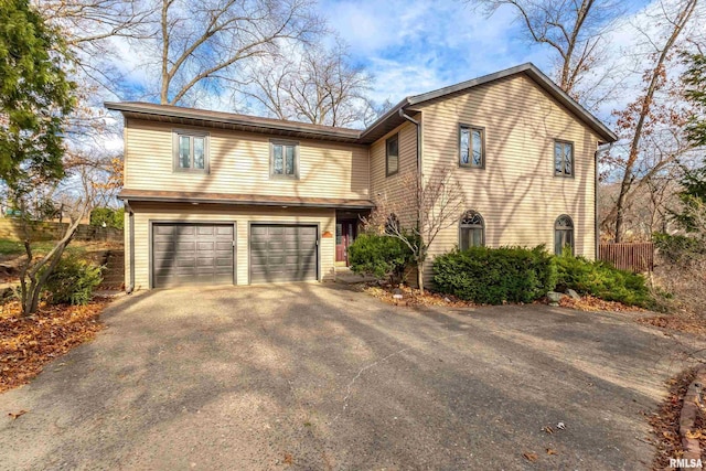 front of property featuring a garage