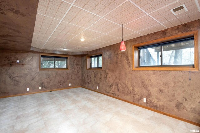 1170 33rd Street Ct, Moline, IL 61265 - below grade area featuring tile patterned floors and a paneled ceiling