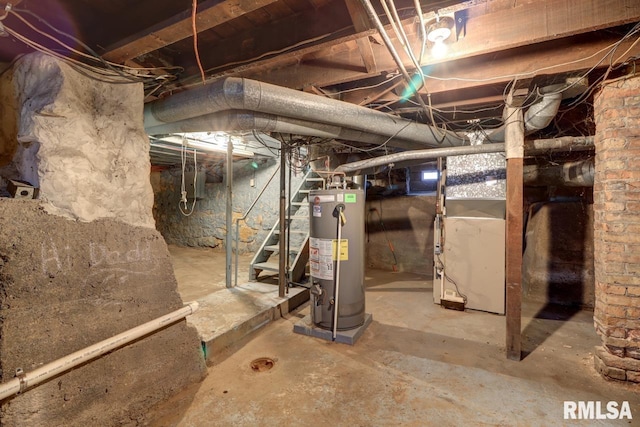1700 Pershing Blvd, Clinton, IA 52732 - unfinished basement with gas water heater and stairs