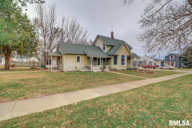 view of front of property with a front lawn