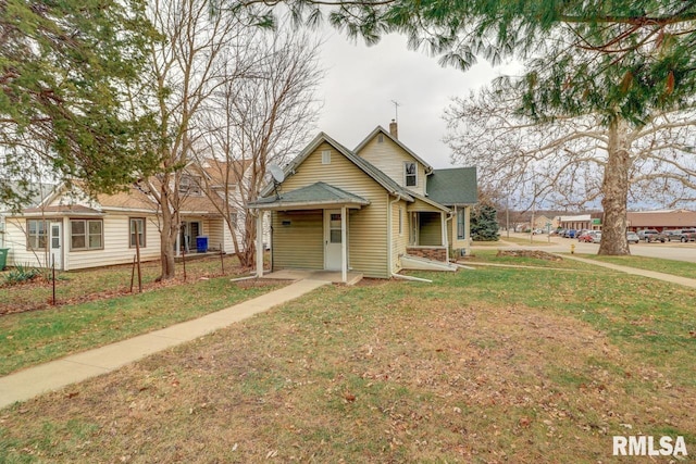 view of front of property with a front lawn