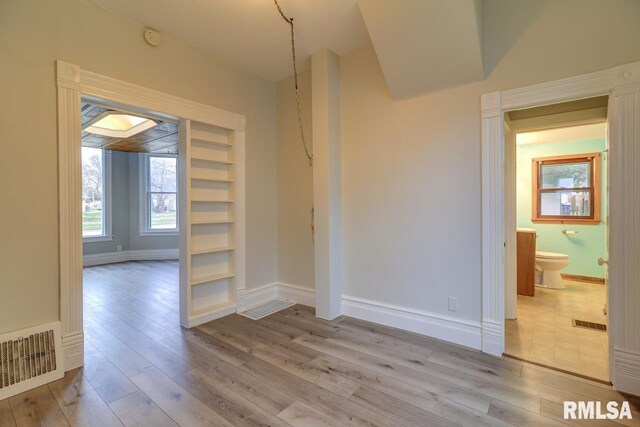 1700 Pershing Blvd, Clinton, IA 52732 - unfurnished room featuring wood-type flooring