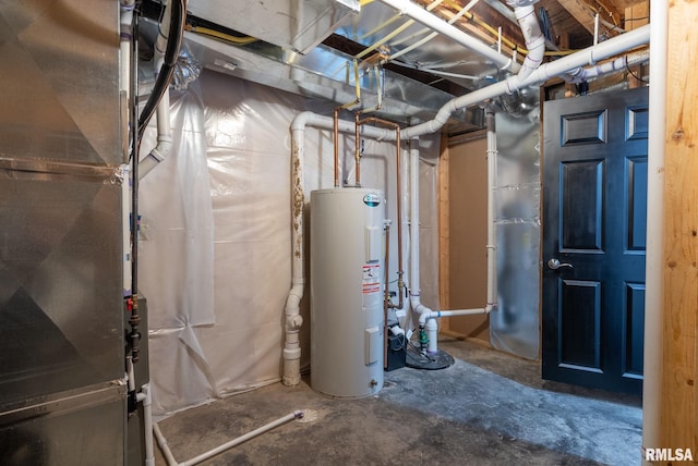 utility room with heating unit and water heater