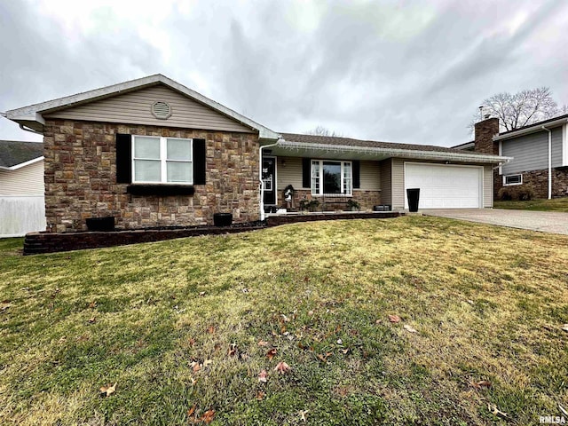 single story home with a garage and a front lawn