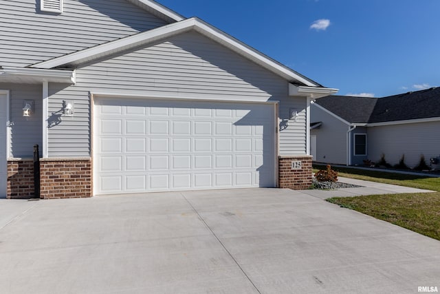 view of side of property with a garage