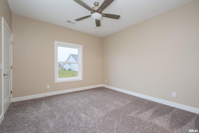 125 Beacon Harbor Cir, East Moline, IL 61244 - carpeted empty room with baseboards, ceiling fan, and visible vents