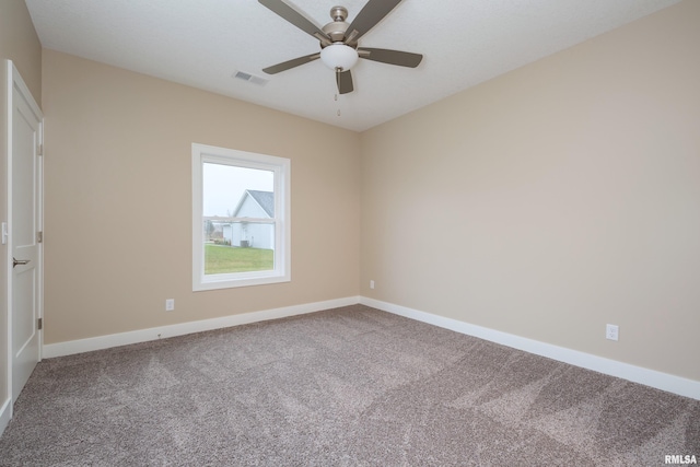 unfurnished room featuring carpet flooring and ceiling fan