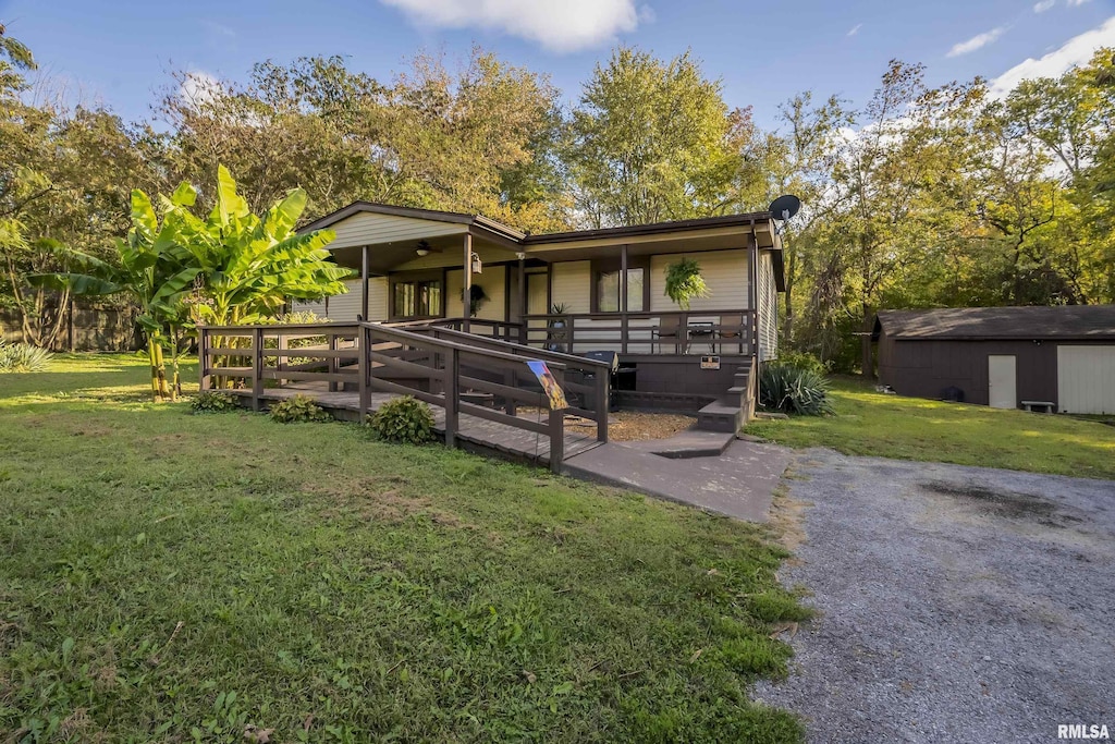 view of front of property with a front lawn and covered porch