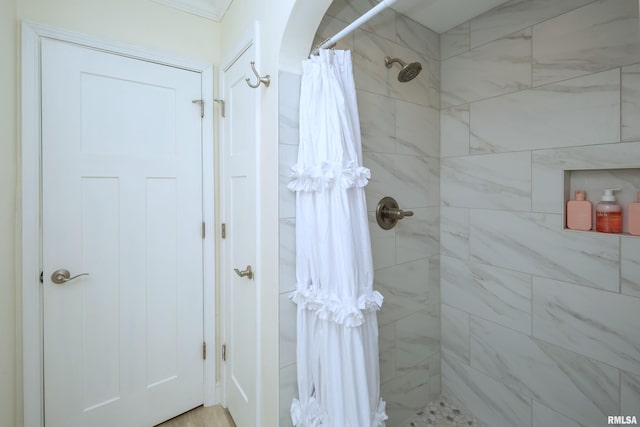 bathroom with a shower with shower curtain