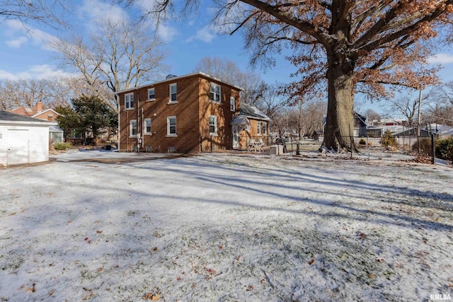 view of snow covered house