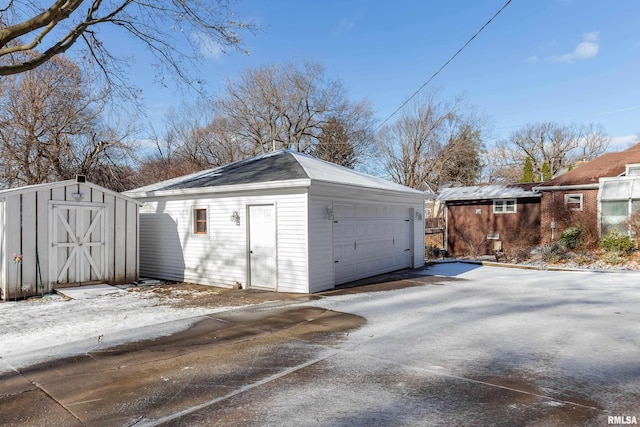 view of snow covered garage