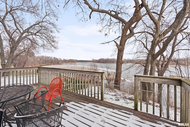 view of snow covered deck