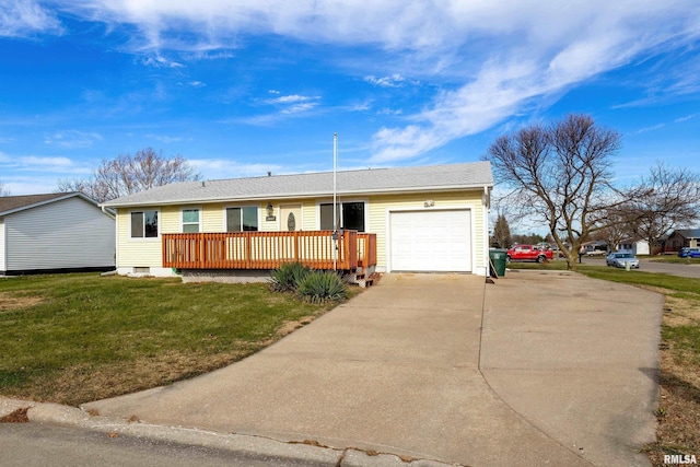 ranch-style house featuring a garage, a deck, and a front lawn