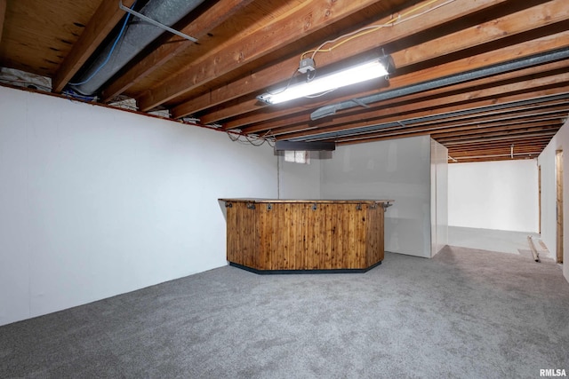 basement with carpet floors