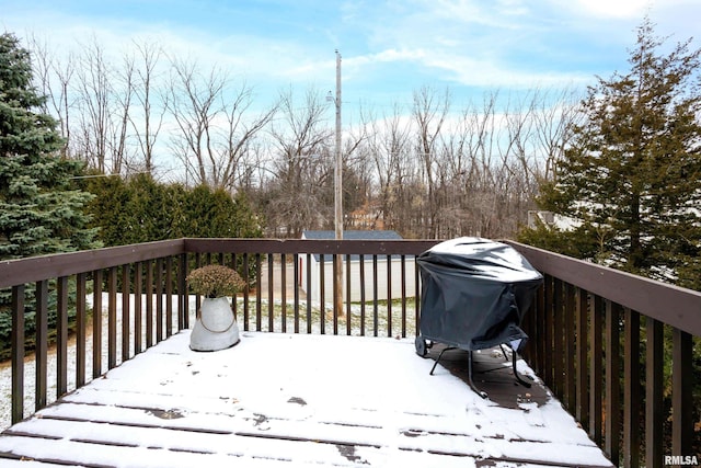 view of snow covered deck