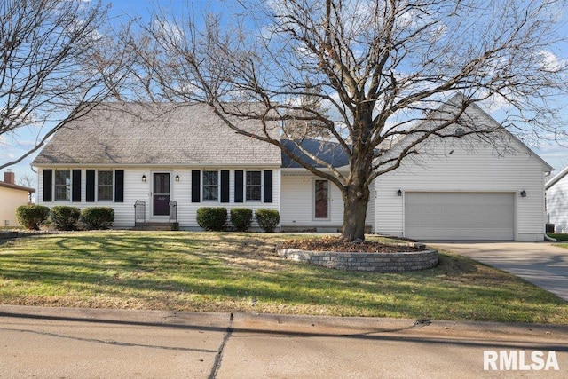 ranch-style house featuring a front yard and a garage