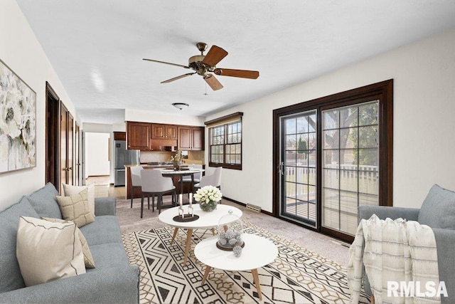 living room featuring ceiling fan