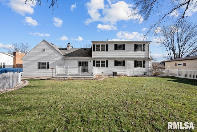 back of house with a yard, central AC unit, and a deck