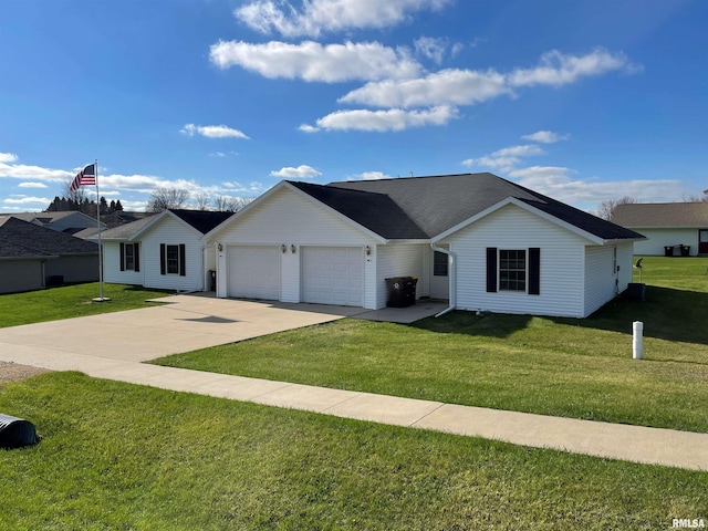 ranch-style house featuring an attached garage, driveway, and a front lawn