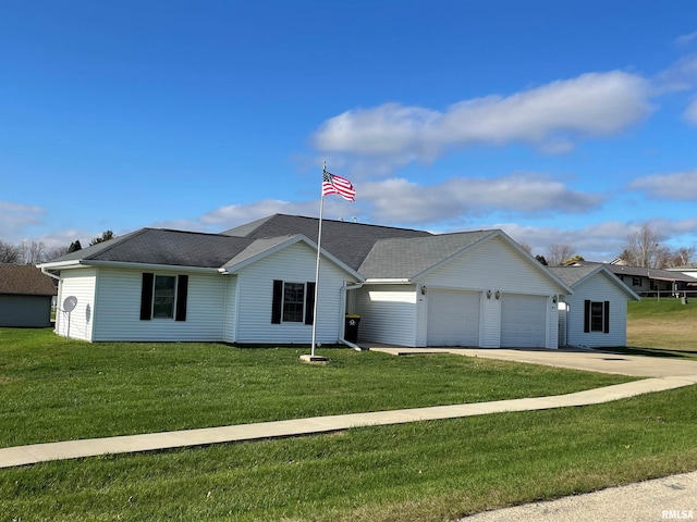 ranch-style house with an attached garage, concrete driveway, and a front yard