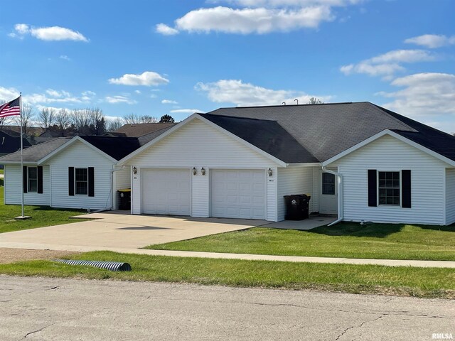 706 Myatt Dr Unit A & B, Maquoketa, IA 52760 - single story home with a garage, driveway, a front lawn, and a shingled roof