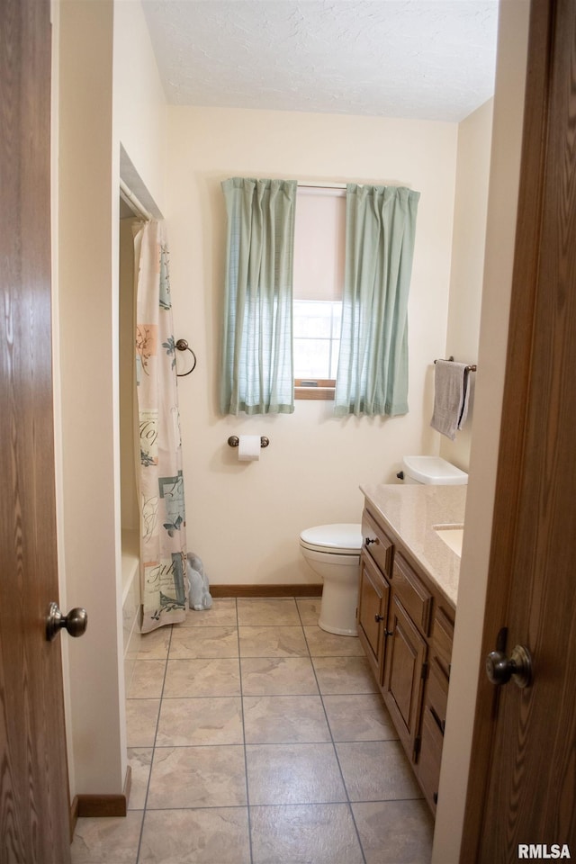 full bathroom with shower / bathtub combination with curtain, tile patterned flooring, vanity, and toilet