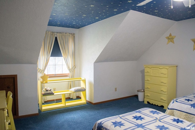 bedroom with carpet flooring, ceiling fan, and lofted ceiling