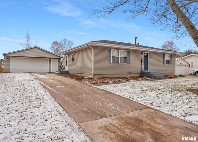 view of front of house featuring an outbuilding and a garage