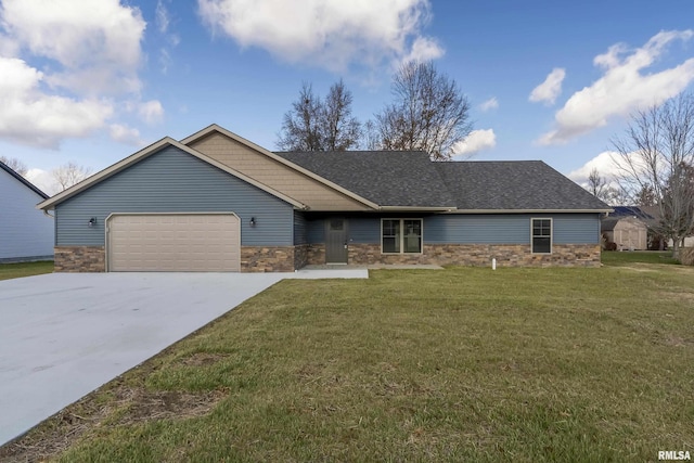 view of front facade featuring a garage and a front lawn