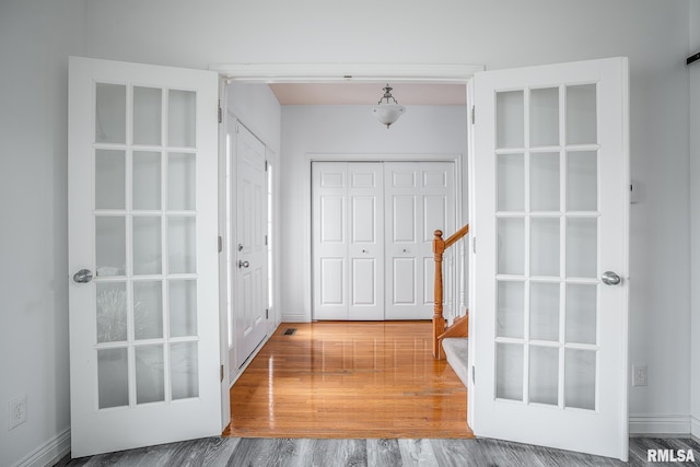 doorway to outside with hardwood / wood-style floors