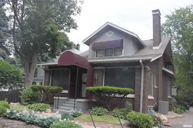 view of front of home with cooling unit