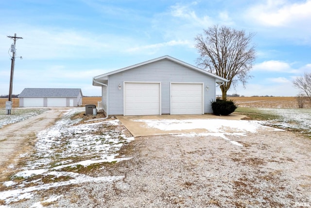 view of snow covered garage