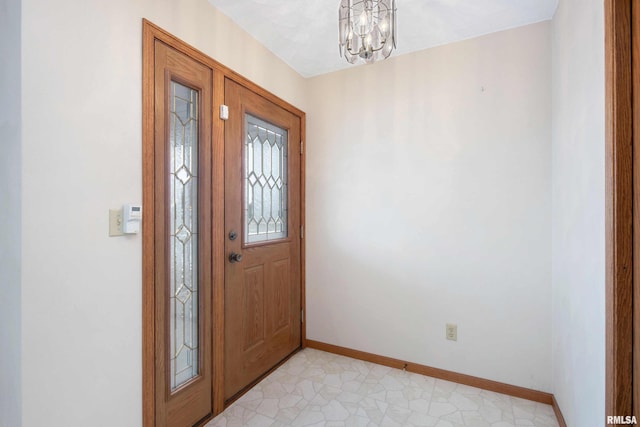 entrance foyer featuring a chandelier