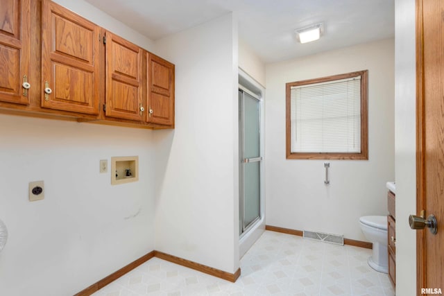 laundry area with hookup for an electric dryer and washer hookup