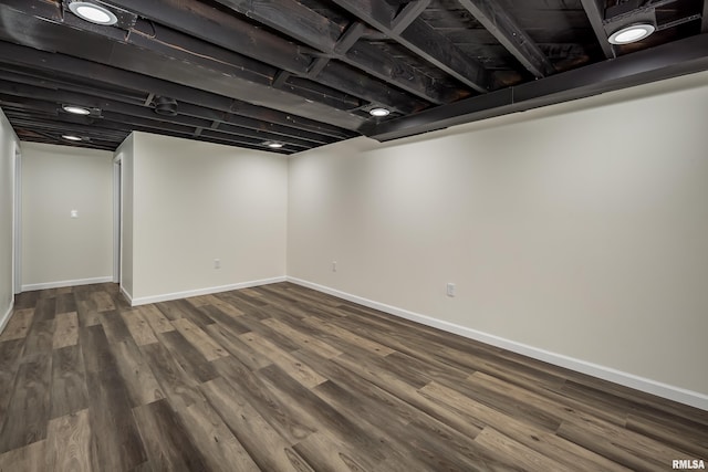 basement featuring hardwood / wood-style flooring