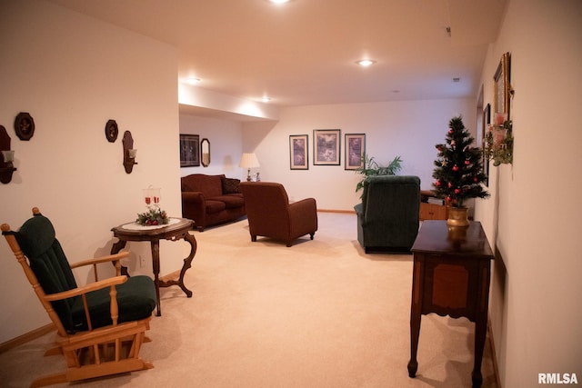 living room with light carpet, baseboards, and recessed lighting