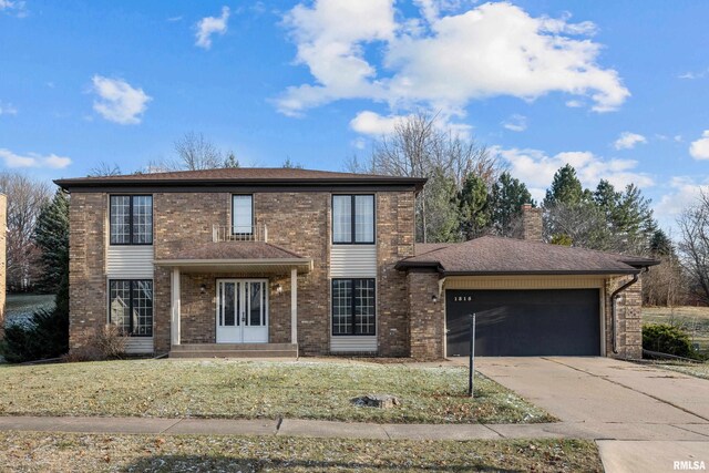 front of property with a garage