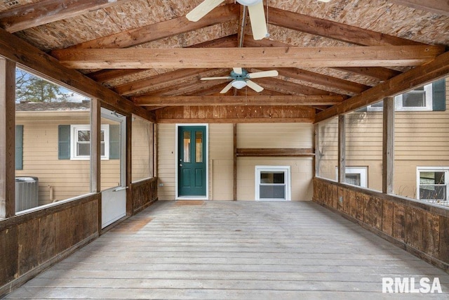 unfurnished sunroom featuring vaulted ceiling with beams and wooden ceiling