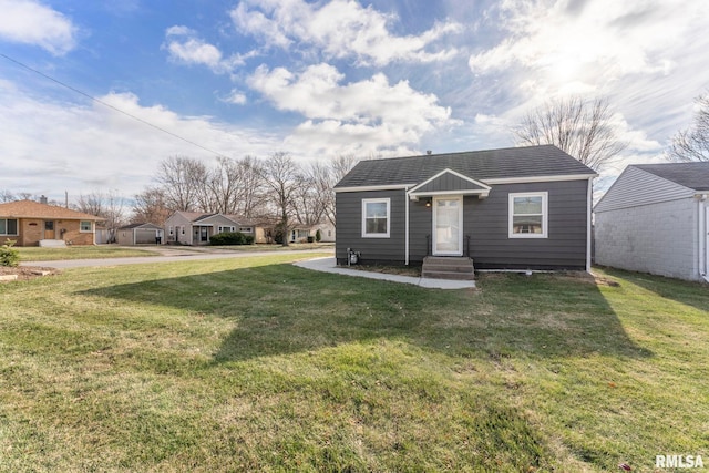 view of front of home with a front yard