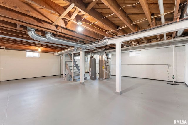 basement with heating unit and water heater