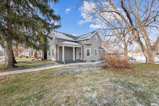 view of front of home with a front lawn