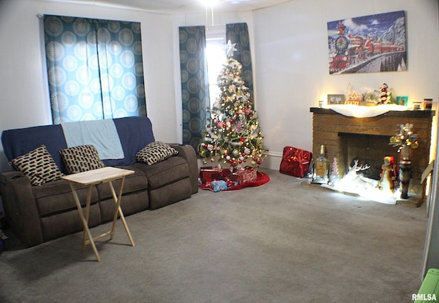 carpeted living room with a fireplace