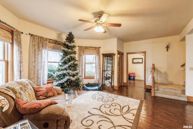 sitting room featuring ceiling fan and dark hardwood / wood-style flooring