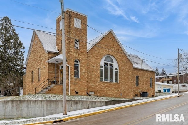 view of property exterior featuring central AC