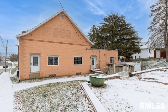 view of snow covered property