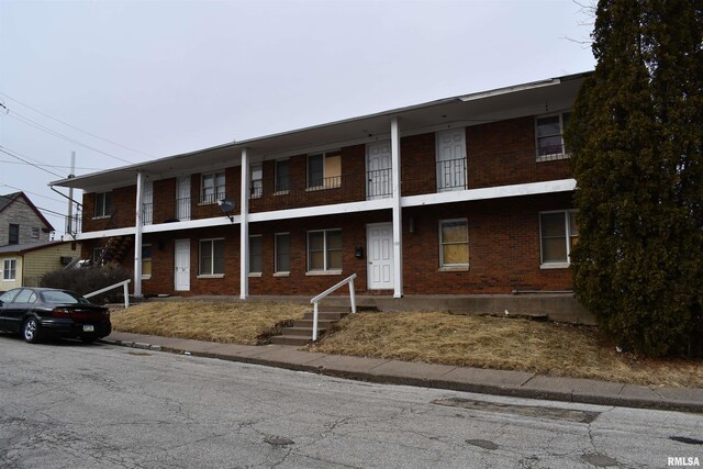 view of property with a balcony