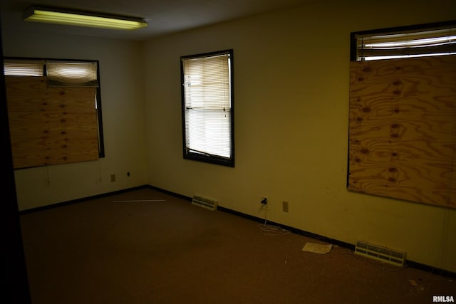 view of carpeted spare room