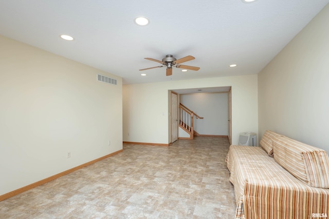 unfurnished room featuring ceiling fan