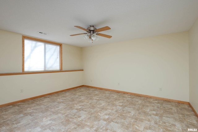 empty room with ceiling fan